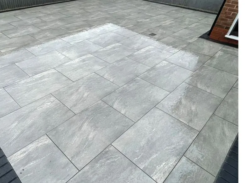 After: Back lawn to grey porcelain - S P Groundworks & Driveways